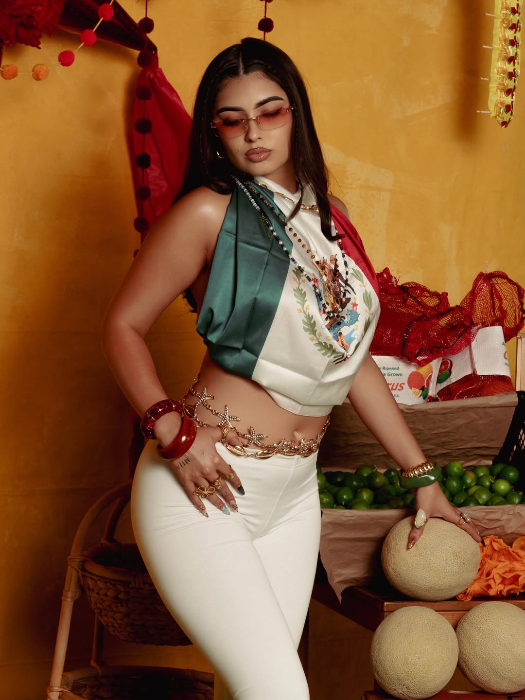Model wearing the Mi Pecado flag scarf top